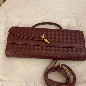 Chic Burgundy Woven Clutch with Gold Details